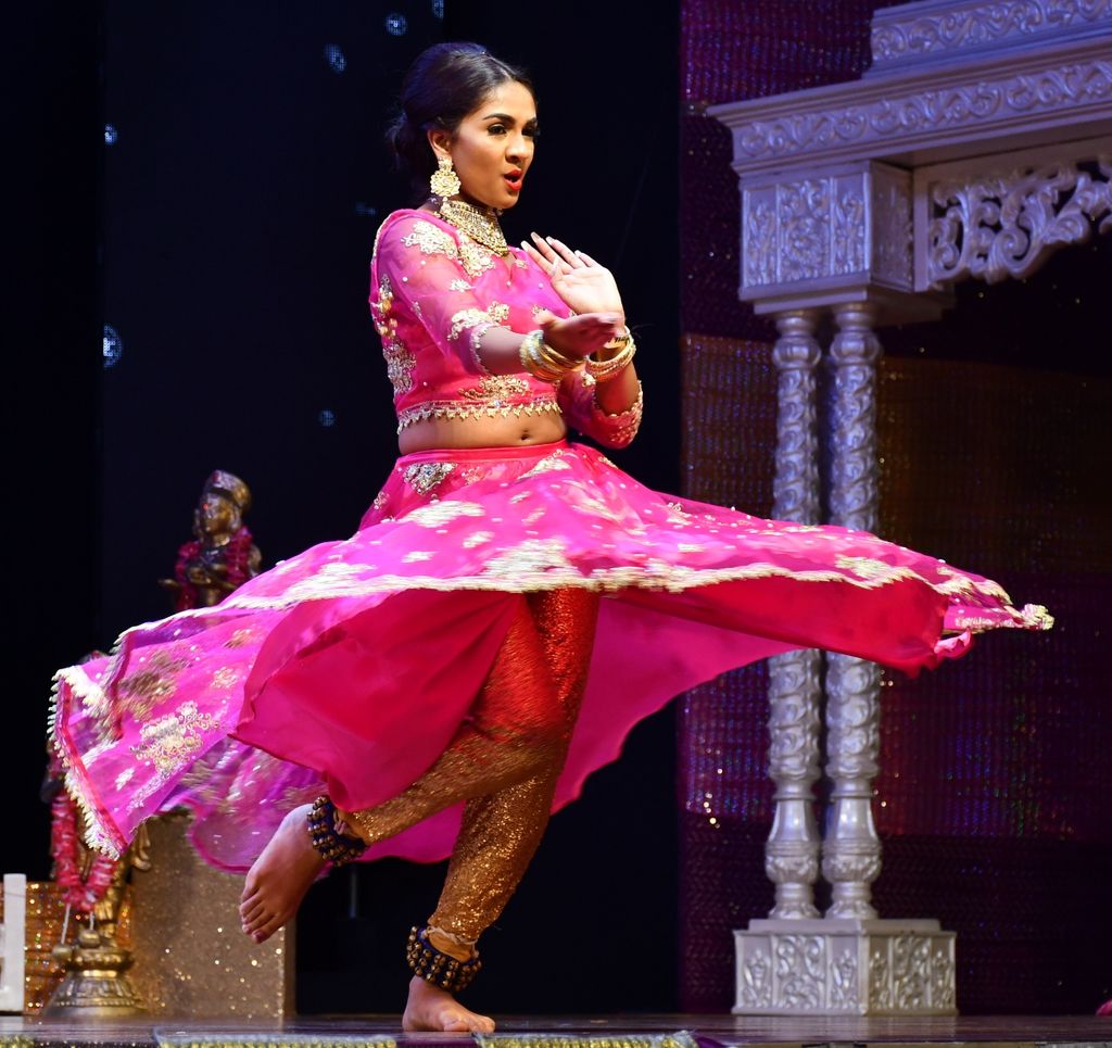 Marisa Beekhoo of Canada dance during the talent section of the pageant.