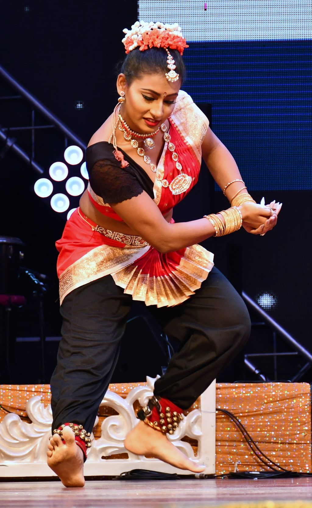 2018 Queen and winner of the talent competition Preejanjali Ria perform a dance during the talent section of the pageant.