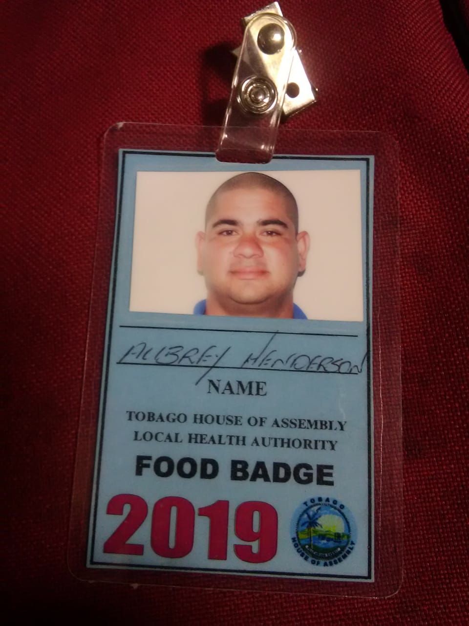 Asylum seeker happy as he gets food badge Trinidad Guardian