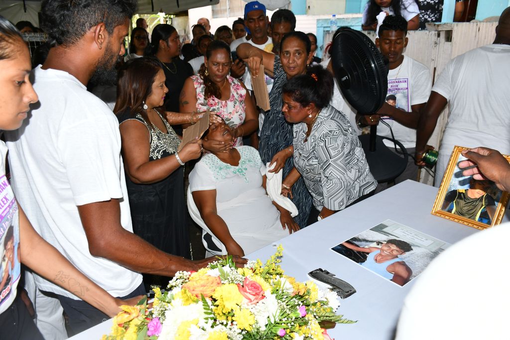 Tearful send off for murdered fisherman Trinidad Guardian