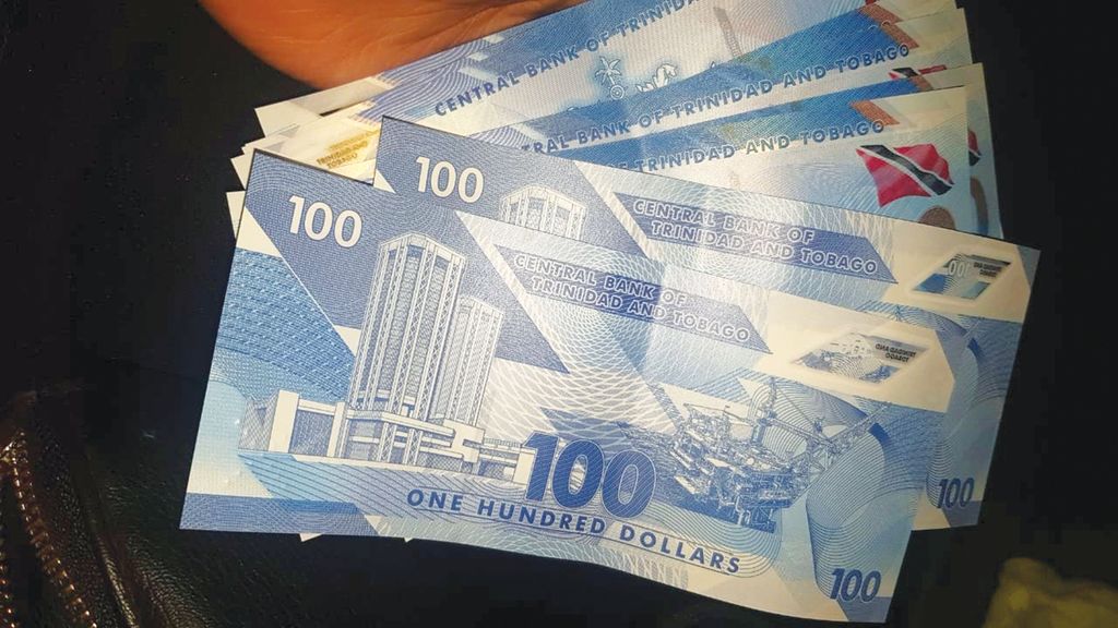 Long lines to exchange 100 notes in Tobago Trinidad Guardian