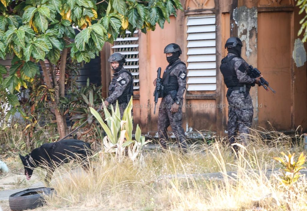 SORT officers raid Maloney building Trinidad Guardian