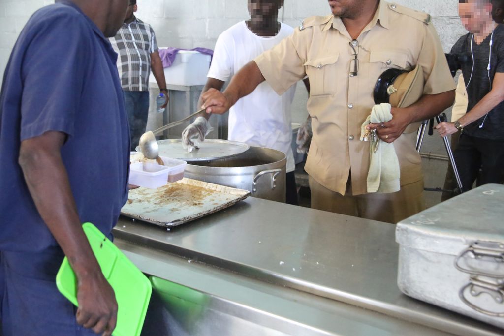 Prison officers cook meals for inmates to curb COVID spread Trinidad