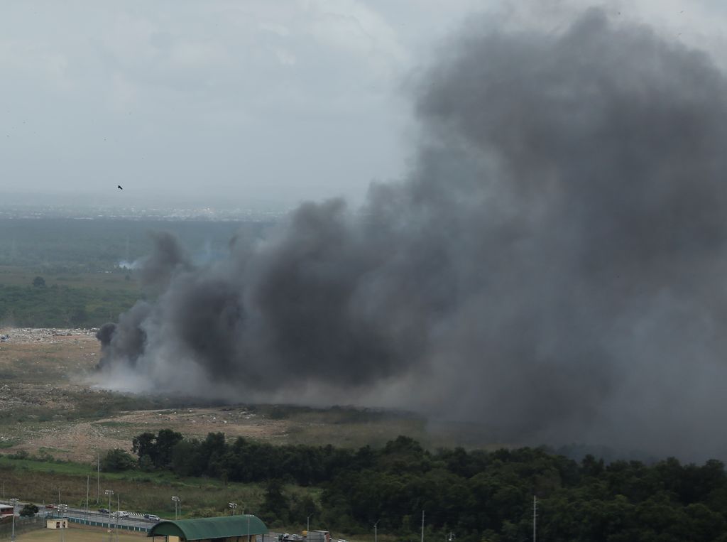 SWMCOL bans salvagers from lighting fires at landfills Trinidad Guardian