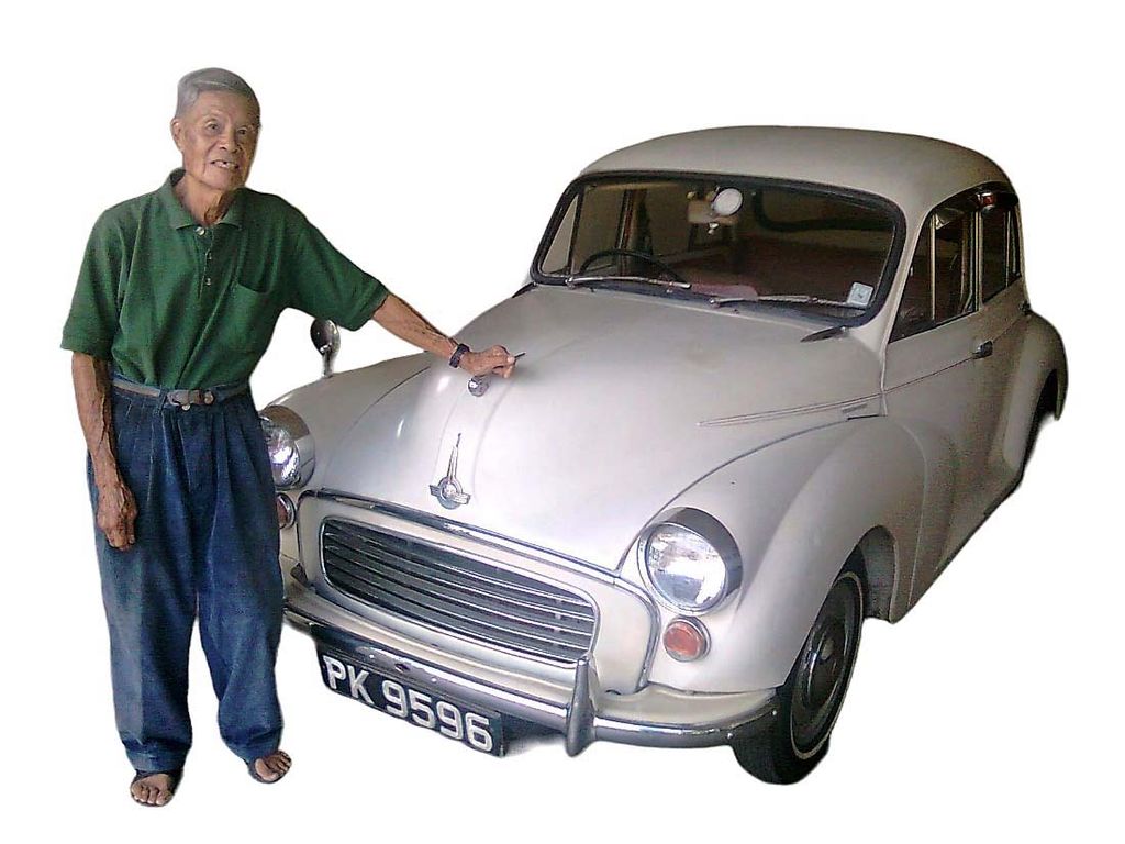 Fatherly bond over beloved antique car Trinidad Guardian