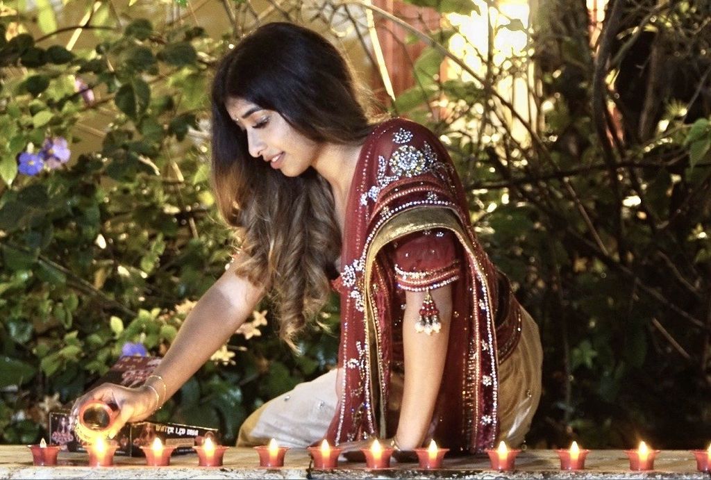 Student invents water-activated deyas for Divali