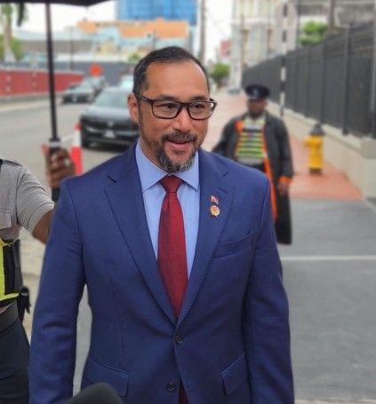 Young calls for Alexander's resignation after triple murder