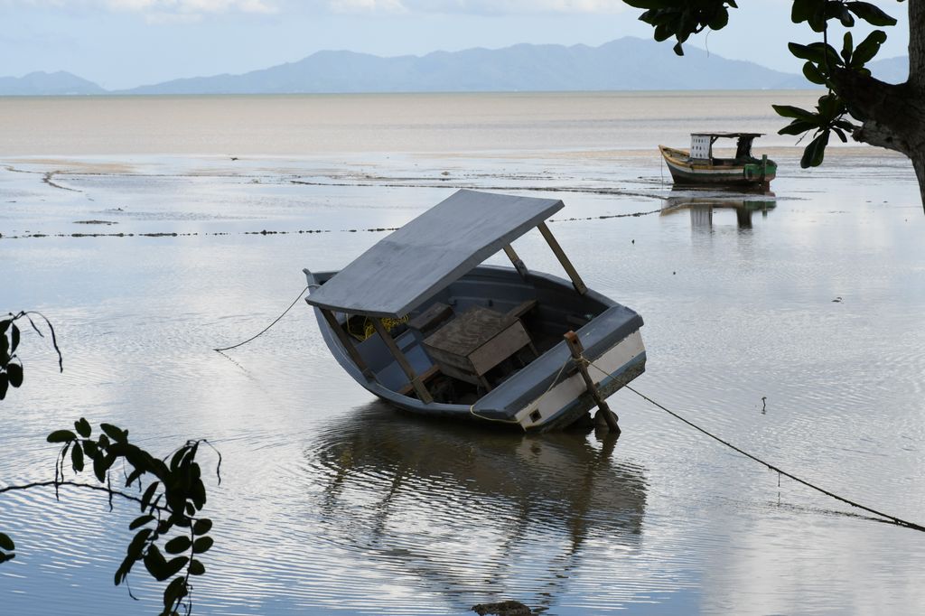 Boats at low tide in the Gulf of Paria at the Temple in the Sea, Waterloo.