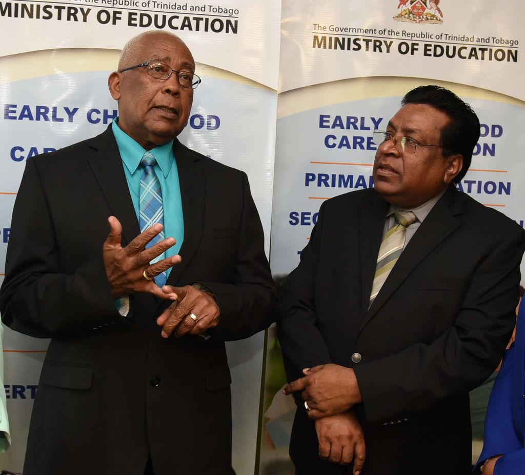 Minister of Education Anthony Garcia, left and Chief Education Officer Harrilal Seecharan.