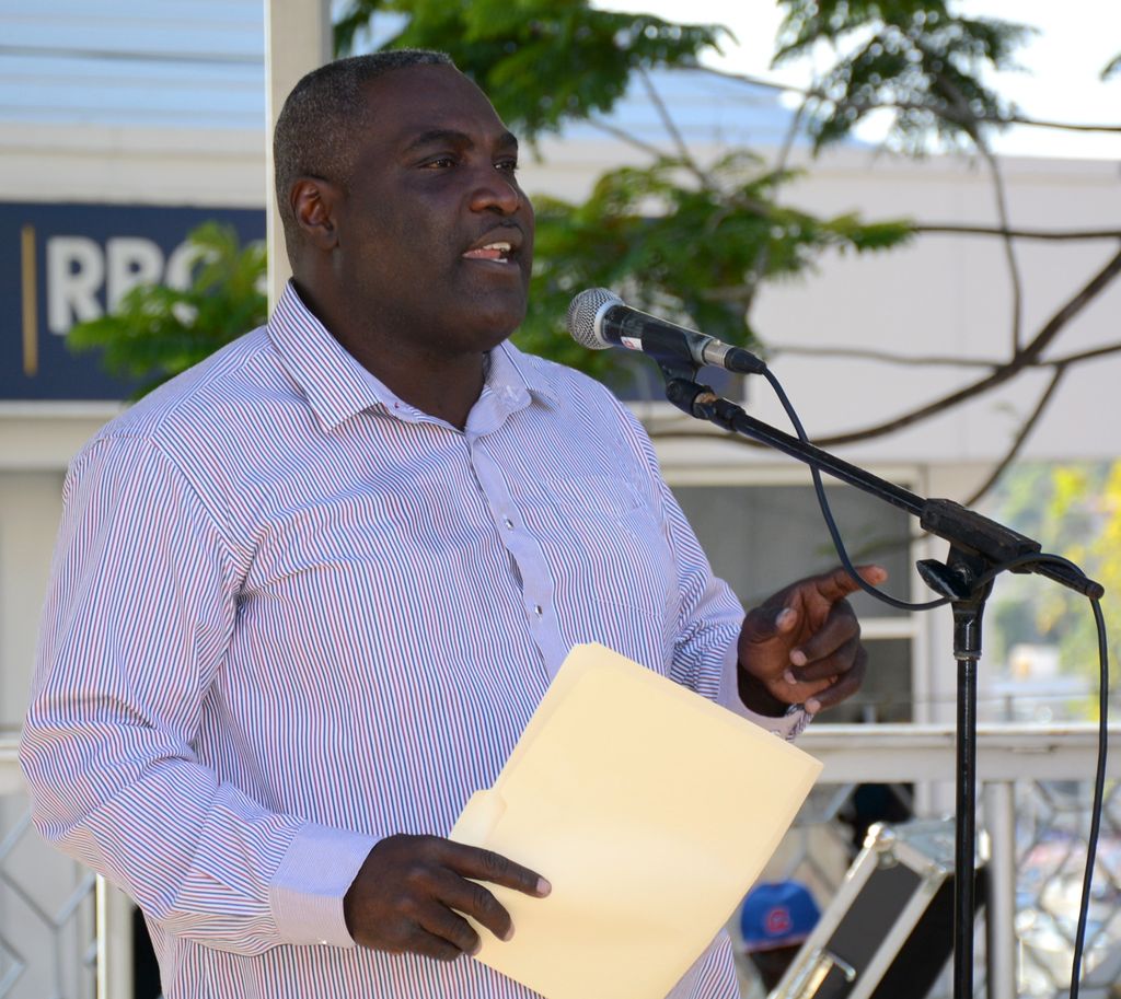 Businessman Demi John Cruickshank speaking at the town meeting on the Sandals pullout at James Park, Scarborough.