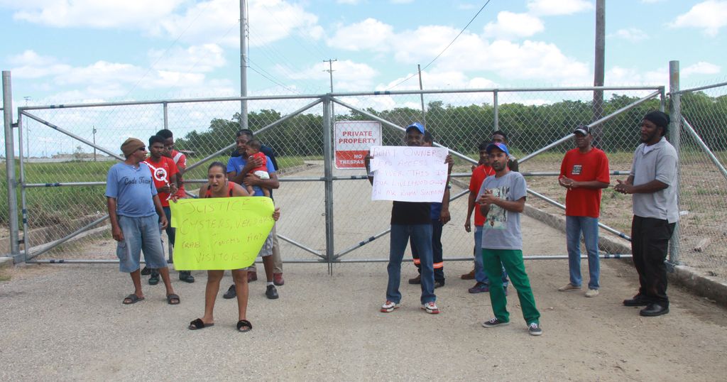 Members of the Crab Catchers and Oyster Sellers Association protest on Monday over the installation of a gate blocking their access to the Godineau River, South Oropouche.