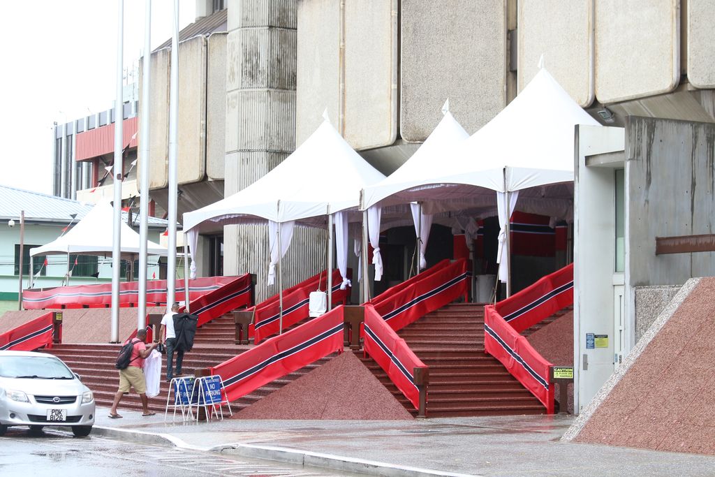 Police officers walk up the steps of the recently decorated Hall of Justice yesterday as they prepare for today’s ceremonial opening of the 2019-2020 Law Term. 