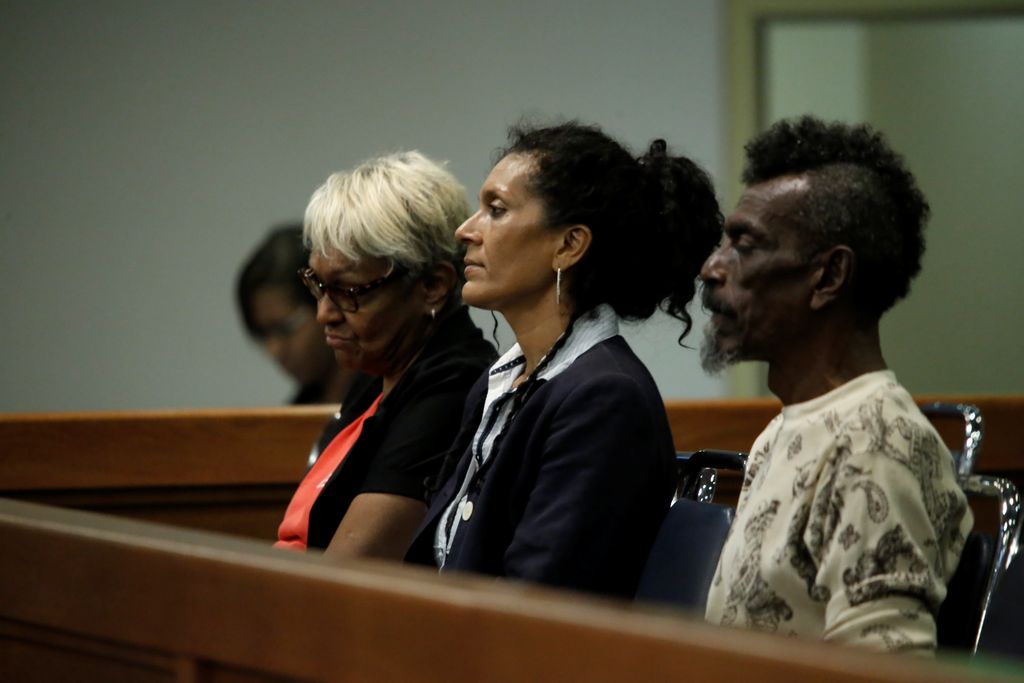 Marijuana activist, Nazma Muller, centre, sits in the Parliament’s public gallery,  yesterday.