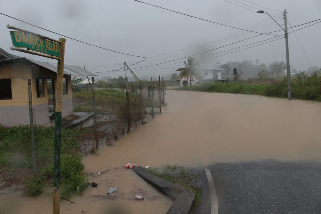 Derrick Road, Penal completely impassable due to flooding.
