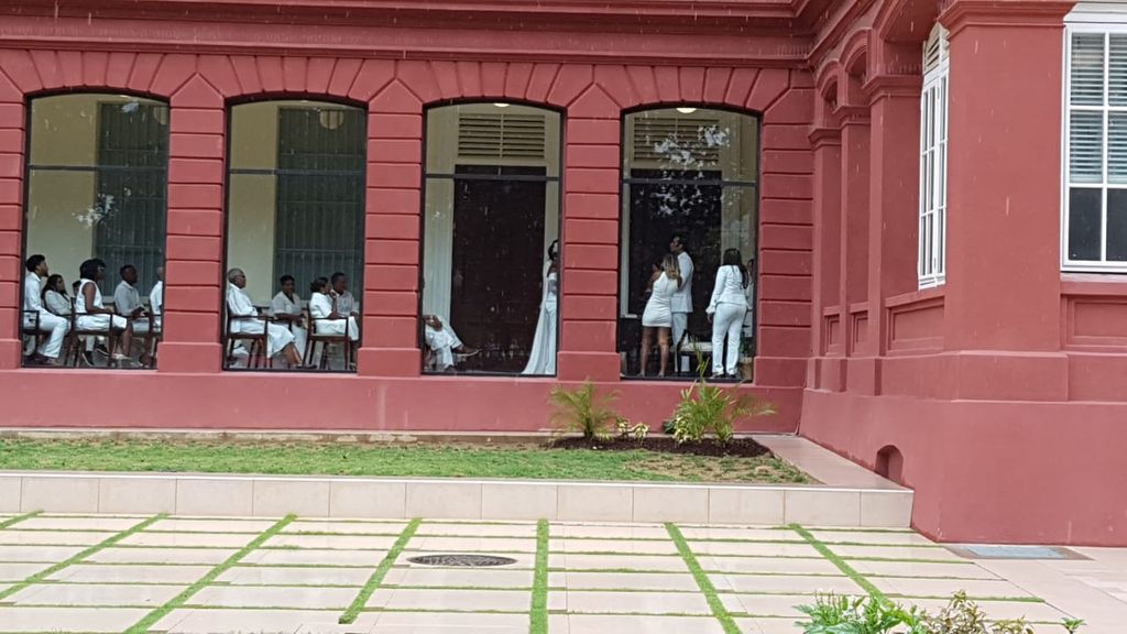 Machel Montano and his wedding party at the Red House for his wedding to Renee Butcher today.