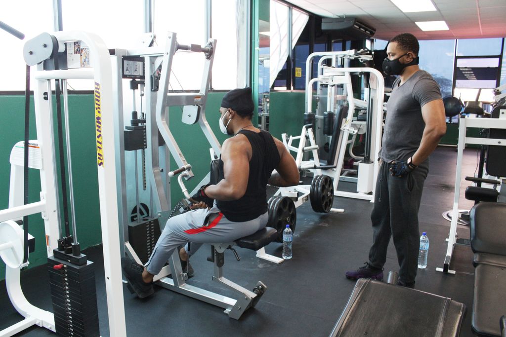 Brothers Christopher and Curron Gordon do circuit training at Health and Fitness Gym, Gulf View in June. 