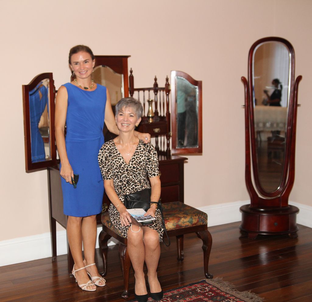 Jesse-Marie Chaves, standing and Heather May-Wittet, relatives of the Prada family who were the first owners of Mille Fleurs, during its handover from Ministry of Community Development Culture and the Arts to the City of Port-of-Spain.