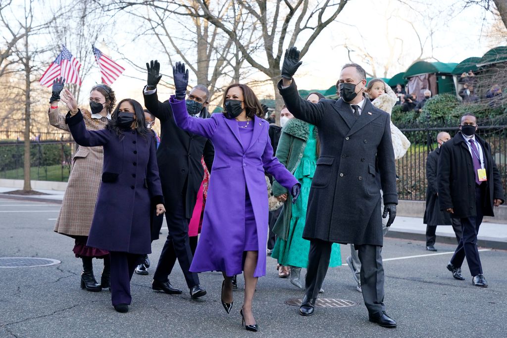 Vice President Kamala Harris, husband Doug Emhoff and family walk near the White House during a Presidential Escort to the White House in Washington yesterday.