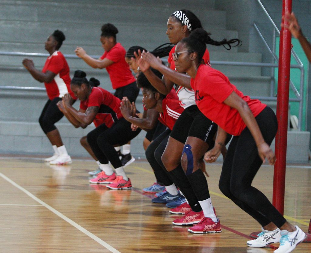International Kalifa McCollin, right, and her national teammates during a drill at a practice session at the Maloney Indoor Sports Arena in September ahead of the "Calypso Girls" Tri-Series in Jamaica in October, last year.