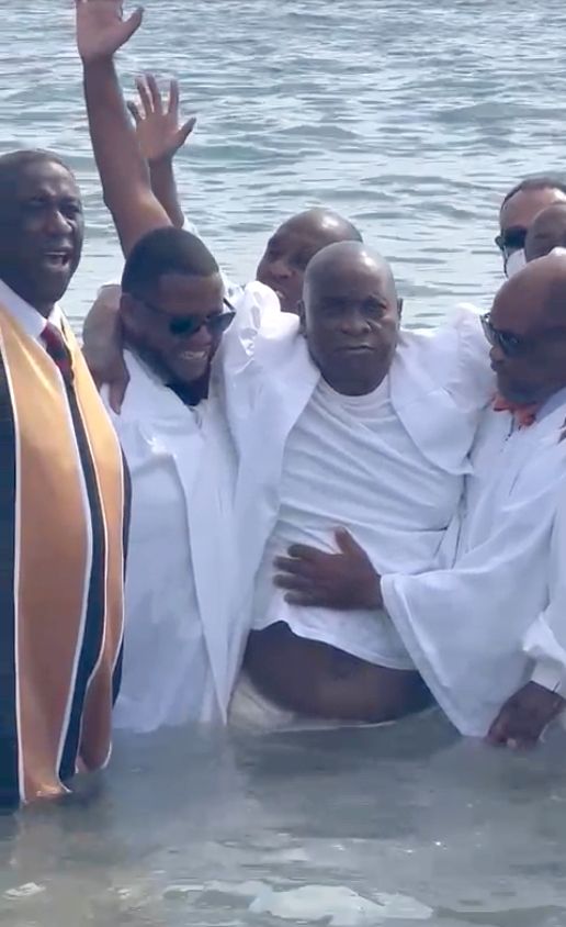 Dr Slinger Francisco, the Mighty Sparrow, accepts Jesus as his Saviour when he was baptised as a member of the Linden Seventh-day Adventist Church in New York on Saturday.