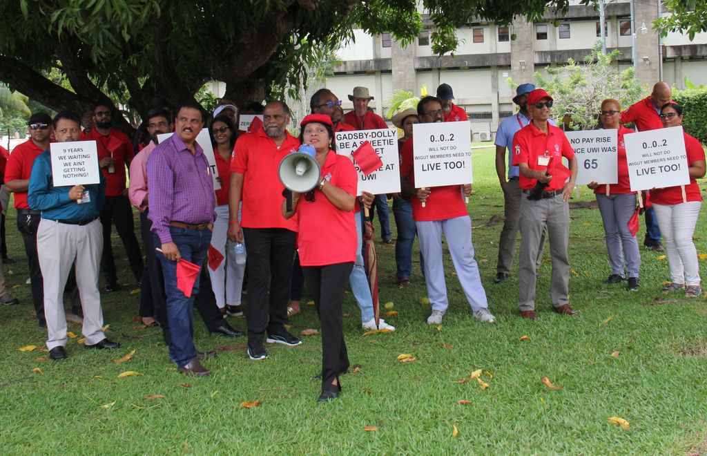  WIGUT TT President Dr. Indira Rampersad lead UWI lectures durng a protest on the compound of the principal office at the UWI St Augustine campus, on Friday.