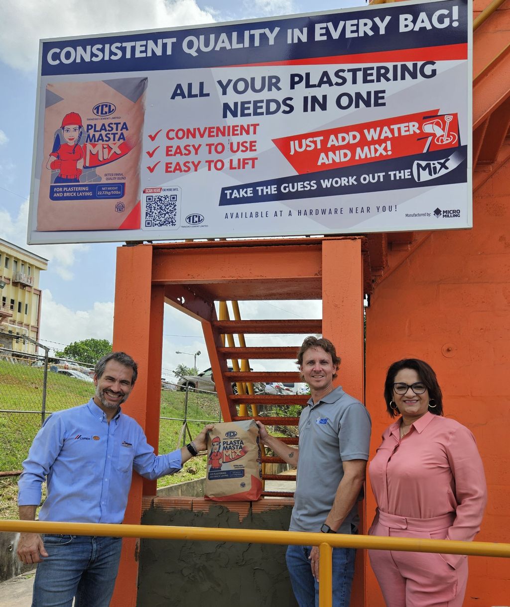 Trinidad Cement Limited (TCL) general manager, Guillermo Rojo, left, Robert de Verteuil, a director of Micro Milling Ltd and TCL’s sales distributor segment manager Reshma Gooljar-Singh, showcase the new product Plasta Masta, at TCL’s compound in Claxton Bay. 