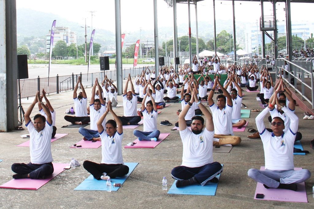Participants of the 11th International Yoga Day event held at the National Carnival Commission in Port-of-Spain, yesterday.