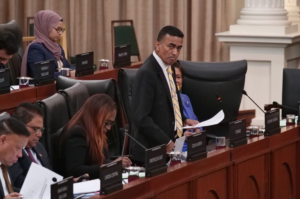 Minister of Finance Davendranath Tancoo starts the debate on the prime minister's pension bill during the fifth sitting of the House of Representatives of the thirteenth parliament in the Red House today.  Photo by Roger Jacob.