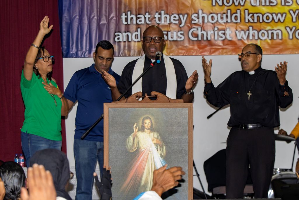 Jesus Explosion 23: Visiting priest feeds RC faithful - Trinidad Guardian